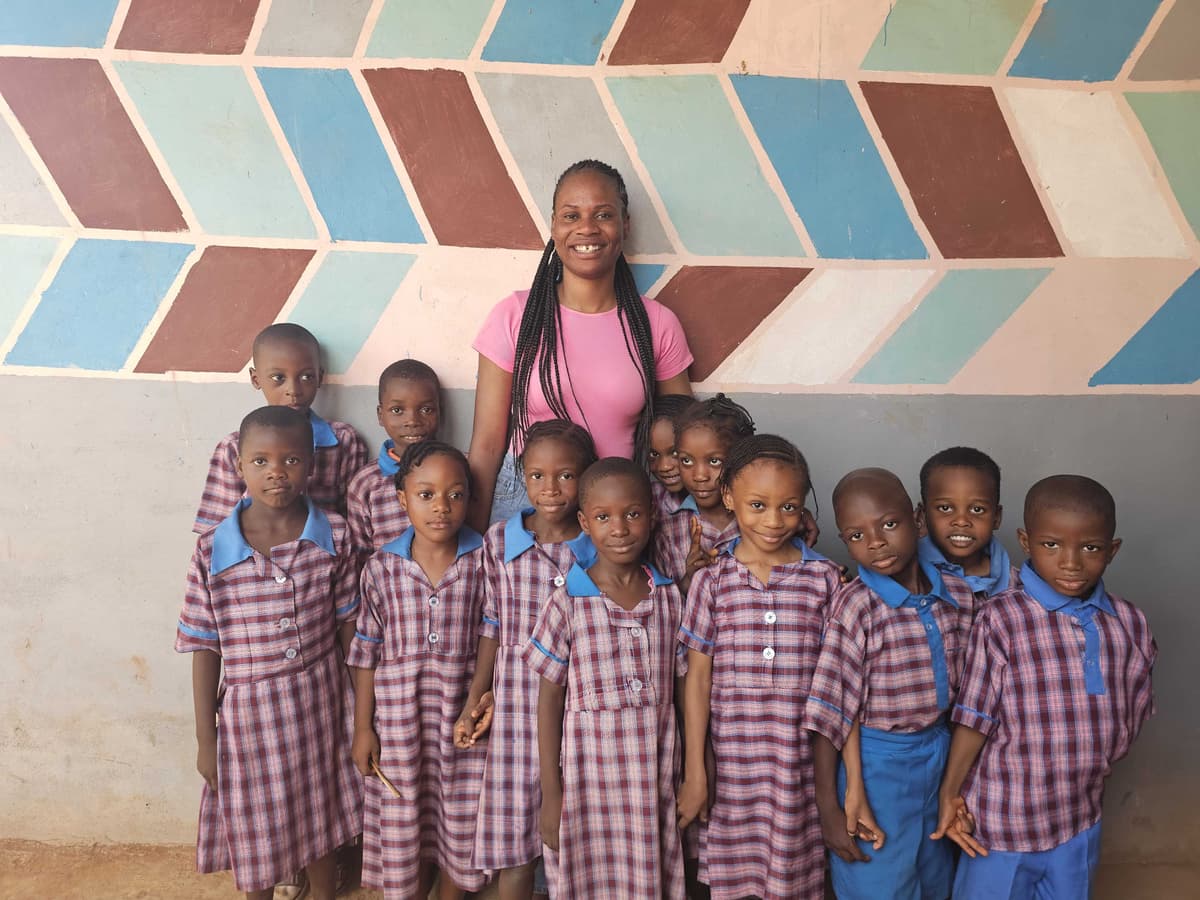HAFAMA Primary pupils with a staff member
